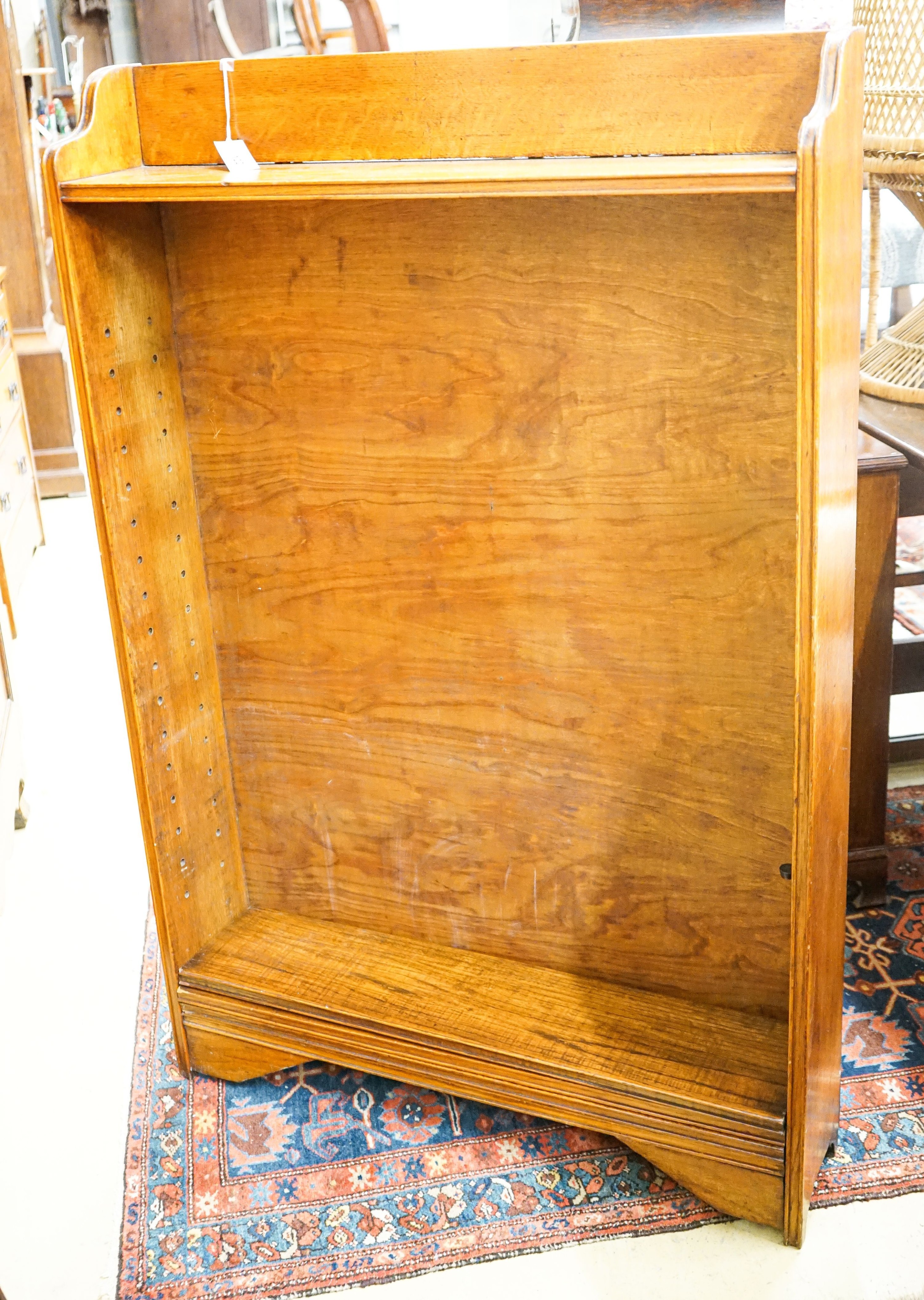 An early 20th century oak open bookcase, width 91cm, depth 20cm, height 140cm